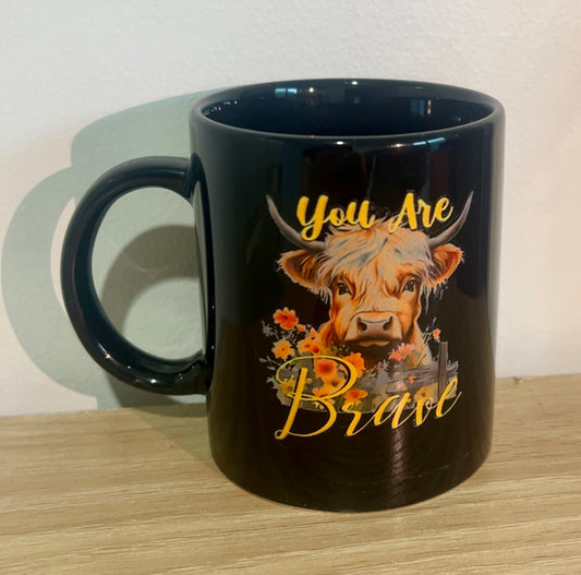 High land cow with floral coffee mug